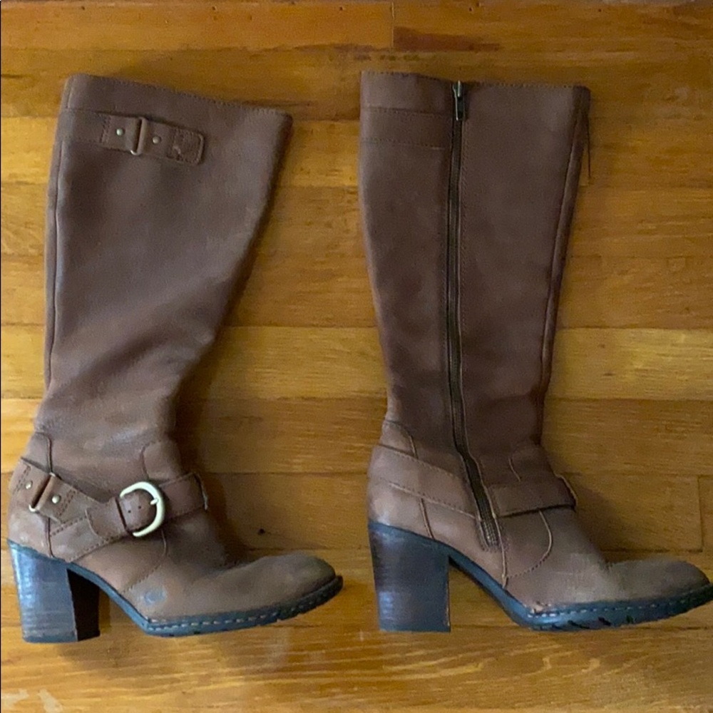 Born tall, riding brown boots